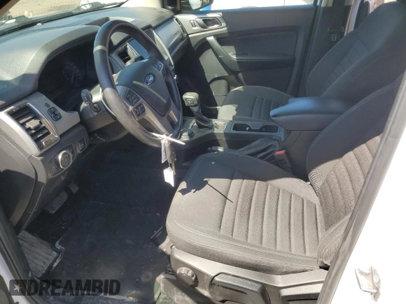 2023 Ford Ranger XL with VIN 1FTER4FH9PLE12457, listed as a Copart auction lot 52674865 with 51,417 mi miles and Salvage title. Bid and sale history available at DreamBid. Image 7.