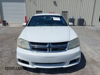 2013 Dodge Avenger SXT with VIN 1C3CDZCB8DN589038, listed as a IAAI auction lot 41985488 with 174,587 mi miles and . Bid and sale history available at DreamBid. Image 6.