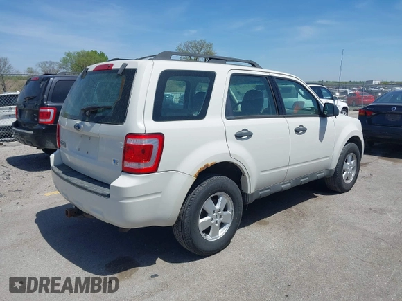 2009 Ford Escape XLS with VIN 1FMCU02759KD02022, listed as a IAAI auction lot 42228347 with 258,533 mi miles and . Bid and sale history available at DreamBid. Image 4.