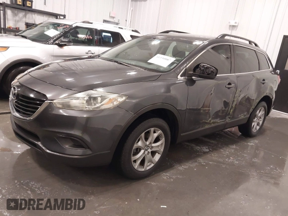 2015 Mazda CX-9 Sport with VIN JM3TB2BA1F0453620, listed as a IAAI auction lot 41330887 with 119,219 mi miles and . Bid and sale history available at carsss.com. Image 18.