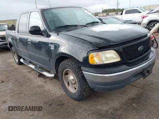2003 Ford F-150 XLT with VIN 1FTRW07623KD67409, listed as a IAAI auction lot 41912067 with 1 mi miles. Bid and sale history available at carsss.com. Image 1.