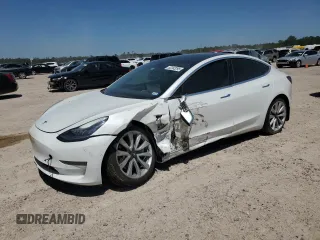 2020 Tesla Model 3 Standard Range Plus with VIN 5YJ3E1EA5LF599280, listed as a Copart auction lot 52383295 with 58,506 mi miles and Salvage Title. Bid and sale history available at DreamBid. Image 1.