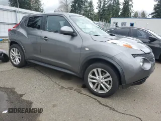 2014 Nissan Juke SV with VIN JN8AF5MV4ET480348, listed as a Copart auction lot 51174635 with 63,350 mi miles and Salvage Title. Bid and sale history available at DreamBid. Image 4.