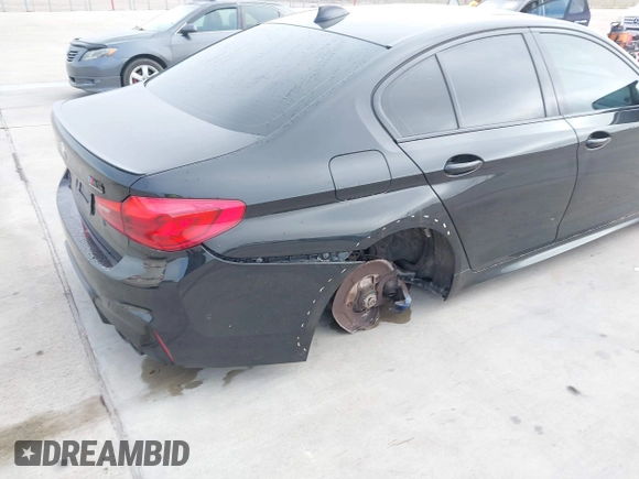 2019 BMW M5 z VIN WBSJF0C51KB447804, wystawiony jako IAAI lot #41848760 z przebiegiem 83 303 mil mil oraz . Historia ofert i sprzedaży dostępna na DreamBid. Obrazek 6.