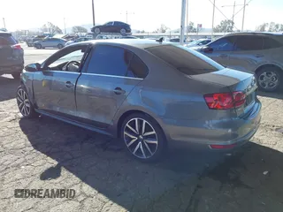 2012 Volkswagen Jetta GLI Autobahn with VIN 3VW4A7AJ5CM085902, listed as a IAAI auction lot 41830844 with 75,869 mi miles and . Bid and sale history available at DreamBid. Image 3.