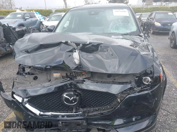 2021 Mazda CX-5 Sport with VIN JM3KFABM1M0356760, listed as a IAAI auction lot 39131600 with 1 mi miles. Bid and sale history available at carsss.com. Image 6.