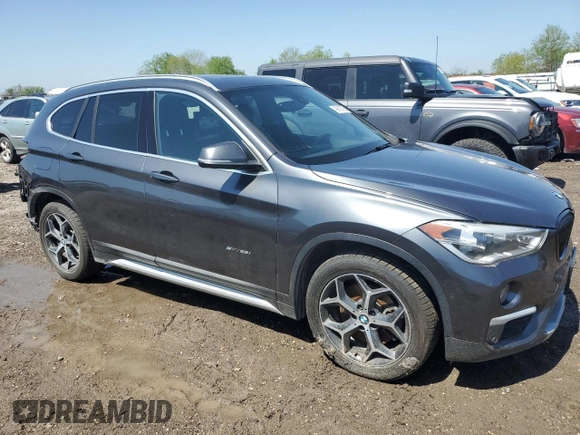 2018 BMW X1 sDrive28i with VIN WBXHU7C31J5L05441, listed as a Copart auction lot 49420595 with 115,003 mi miles and Salvage Title. Bid and sale history available at carsss.com. Image 4.