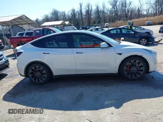 2021 Tesla Model Y Performance with VIN 5YJYGDEF8MF246658, listed as a IAAI auction lot 41679793 with 28,015 mi miles and . Bid and sale history available at DreamBid. Image 13.