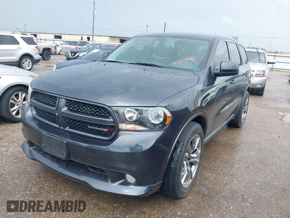 2013 Dodge Durango R/T with VIN 1C4SDHCT6DC658802, listed as a IAAI auction lot 42510985 with 67,653 mi miles and . Bid and sale history available at DreamBid. Image 16.