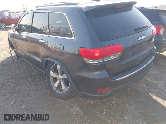 2014 Jeep Grand Cherokee Limited with VIN 1C4RJEBGXEC499052, listed as a IAAI auction lot 41665838 with 160,473 mi miles. Bid and sale history available at carsss.com. Image 3.