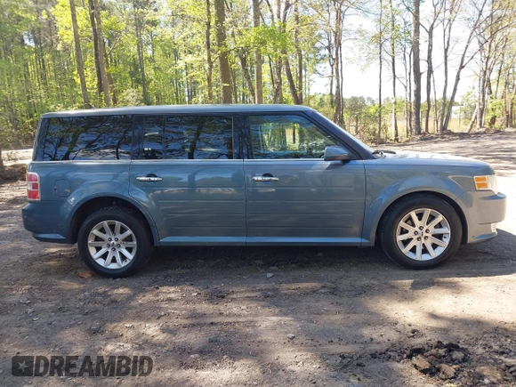 2010 Ford Flex SEL z VIN 2FMHK6CC6ABD00482, wystawiony jako IAAI lot #42054488 z przebiegiem 208 231 mil mil oraz . Historia ofert i sprzedaży dostępna na DreamBid. Obrazek 13.
