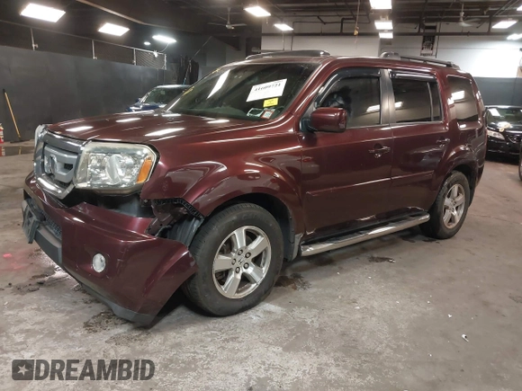 2009 Honda Pilot EX-L with VIN 5FNYF48569B021586, listed as a IAAI auction lot 41609721 with 291,598 mi miles. Bid and sale history available at carsss.com. Image 2.