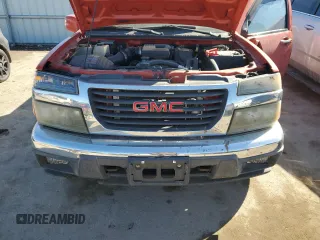 2009 GMC Canyon Work Truck z VIN 1GTDT19EX98142609, wystawiony jako Copart lot #46698275 z przebiegiem 74 910 mil mil oraz Szkoda całkowita • Salvage title. Historia ofert i sprzedaży dostępna na DreamBid. Obrazek 12.