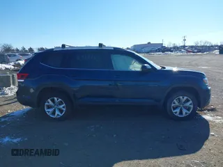 2018 Volkswagen Atlas SE with VIN 1V2DP2CA6JC592774, listed as a IAAI auction lot 41389952 with 58,546 mi miles and . Bid and sale history available at DreamBid. Image 13.