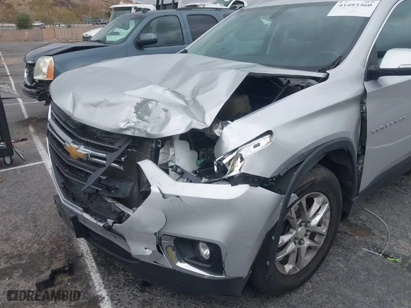 2021 Chevrolet Traverse LT Cloth with VIN 1GNERGKW7MJ257900, listed as a IAAI auction lot 41493360 with 47,412 mi miles. Bid and sale history available at carsss.com. Image 6.