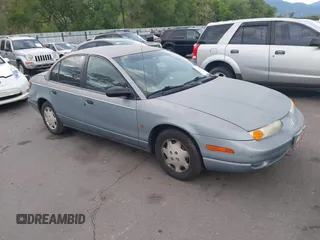 2002 Saturn SL z VIN 1G8ZH52882Z203324, wystawiony jako IAAI lot #42476384 z przebiegiem 159 132 mil mil oraz . Historia ofert i sprzedaży dostępna na DreamBid. Obrazek 1.