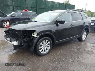 2010 Mazda CX-9 Grand Touring with VIN JM3TB2MV6A0218378, listed as a IAAI auction lot 42292237 with 114,657 mi miles and . Bid and sale history available at DreamBid. Image 2.