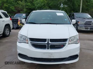 2015 Dodge Grand Caravan SXT with VIN 2C4RDGCG2FR548433, listed as a IAAI auction lot 42121256 with 161,459 mi miles and . Bid and sale history available at DreamBid. Image 6.