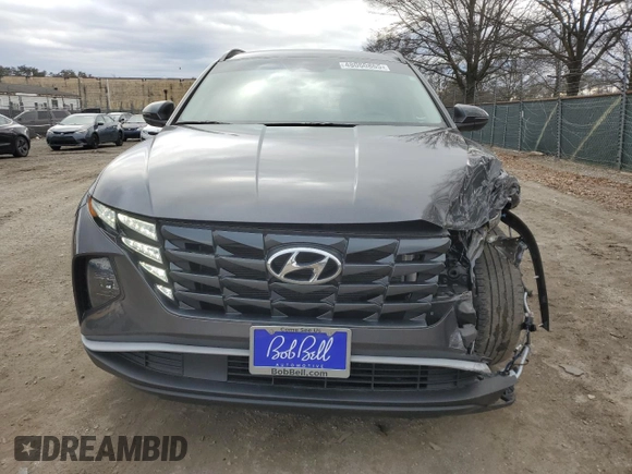 2022 Hyundai Tucson SEL with VIN 5NMJBCAE0NH070468, listed as a Copart auction lot 48060865 with 51,844 mi miles and Salvage Title. Bid and sale history available at carsss.com. Image 5.