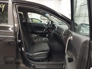 2020 Kia Sportage LX with VIN KNDPMCACXL7804797, listed as a IAAI auction lot 42011299 with 49,793 mi miles and . Bid and sale history available at carsss.com. Image 5.