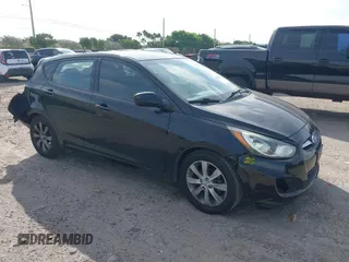2012 Hyundai Accent SE with VIN KMHCU5AEXCU038529, listed as a IAAI auction lot 41624846 with 153,647 mi miles. Bid and sale history available at carsss.com. Image 1.