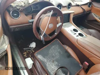 2012 Fisker Karma EcoSport z VIN YH4K14AA7CA001008, wystawiony jako Copart lot #85123424 z przebiegiem Nie podano mil oraz Tytuł czysty. Historia ofert i sprzedaży dostępna na DreamBid. Obrazek 8.