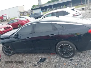 2023 Kia K5 GT-Line z VIN 5XXG64J20PG213348, wystawiony jako IAAI lot #42333459 z przebiegiem 34 392 mil mil oraz . Historia ofert i sprzedaży dostępna na DreamBid. Obrazek 13.