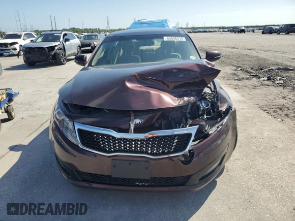 2013 Kia Optima EX z VIN 5XXGN4A70DG186128, wystawiony jako Copart lot #65836315 z przebiegiem 124 488 mil mil oraz Czysty tytuł • Clean title. Historia ofert i sprzedaży dostępna na DreamBid. Obrazek 5.