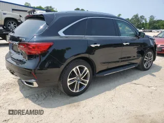 2017 Acura MDX Advance z VIN 5FRYD4H9XHB006658, wystawiony jako Copart lot #59113645 z przebiegiem 107 465 mil mil oraz Szkoda całkowita • Salvage title. Historia ofert i sprzedaży dostępna na DreamBid. Obrazek 3.