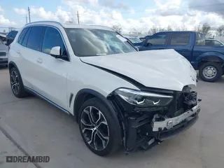 2023 BMW X5 sDrive40i with VIN 5UXCR4C06P9P25676, listed as a IAAI auction lot 41169422 with 26,000 mi miles. Bid and sale history available at carsss.com. Image 1.