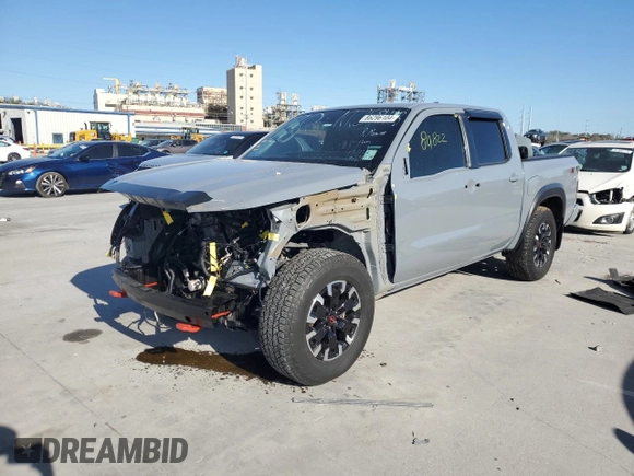 2022 Nissan Frontier Pro-X with VIN 1N6ED1EJ4NN647123, listed as a Copart auction lot 86296104 with 80,822 mi miles and Salvage title. Bid and sale history available at DreamBid. Image 1.
