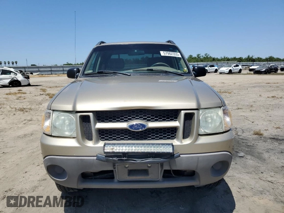 2001 Ford Explorer Sport Trac with VIN 1FMZU67E61UC71358, listed as a Copart auction lot 57982355 with 108,601 mi miles and Salvage title. Bid and sale history available at DreamBid. Image 5.