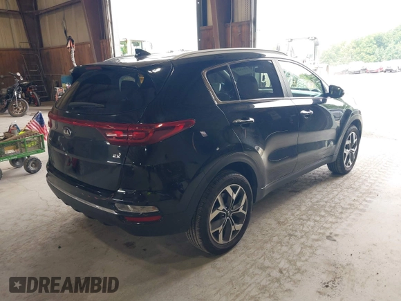 2021 Kia Sportage EX z VIN KNDPNCAC5M7886551, wystawiony jako IAAI lot #42645206 z przebiegiem 49 312 mil mil oraz . Historia ofert i sprzedaży dostępna na DreamBid. Obrazek 4.
