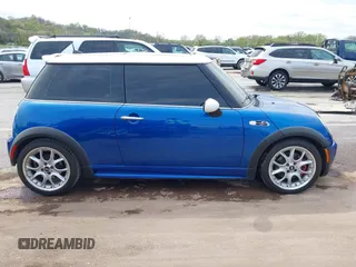 2006 MINI Hardtop S z VIN WMWRE33596TL23436, wystawiony jako IAAI lot #42011749 z przebiegiem 73 381 mil mil oraz . Historia ofert i sprzedaży dostępna na DreamBid. Obrazek 13.