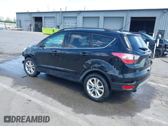 2018 Ford Escape SE z VIN 1FMCU9GD1JUD48846, wystawiony jako IAAI lot #42112952 z przebiegiem 117 580 mil mil oraz . Historia ofert i sprzedaży dostępna na DreamBid. Obrazek 3.