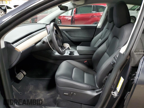 2024 Tesla Model Y Long Range with VIN 7SAYGDEE1RA254860, listed as a Copart auction lot 50750225 with 12,343 mi miles and Salvage Title. Bid and sale history available at DreamBid. Image 7.