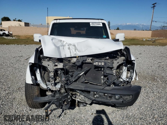 2022 Ford Bronco with VIN 1FMDE5DHXNLB79200, listed as a Copart auction lot 49372444 with 50,686 mi miles and Salvage Title. Bid and sale history available at DreamBid. Image 5.