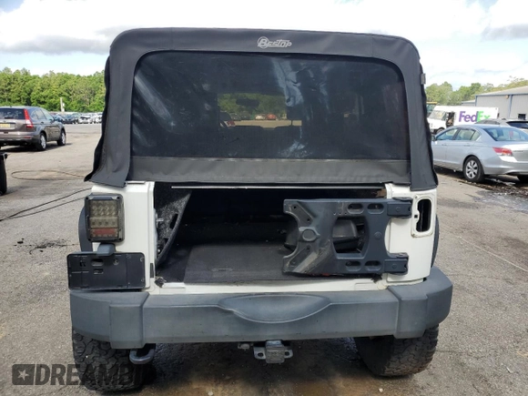 2010 Jeep Wrangler Unlimited Rubicon with VIN 1J4BA6H10AL176014, listed as a Copart auction lot 57092255 with 138,253 mi miles and Salvage title. Bid and sale history available at DreamBid. Image 6.