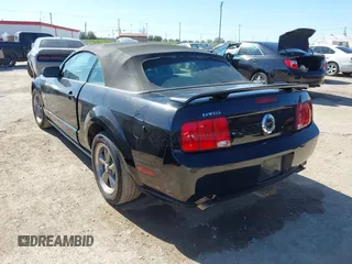 2005 Ford Mustang GT Deluxe with VIN 1ZVFT85H455226449, listed as a IAAI auction lot 41771971 with 128,570 mi miles and . Bid and sale history available at DreamBid. Image 3.