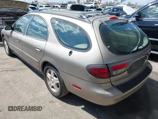 2002 Ford Taurus z VIN 1FAHP59U52G115825, wystawiony jako IAAI lot #41904552 z przebiegiem 91 004 mil mil oraz . Historia ofert i sprzedaży dostępna na DreamBid. Obrazek 3.