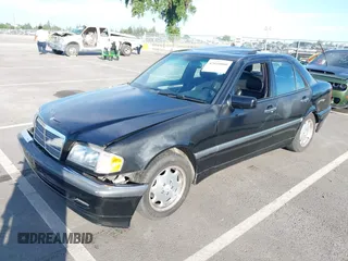 2000 Mercedes-Benz C 230 Kompressor z VIN WDBHA24G4YA799207, wystawiony jako IAAI lot #42010800 z przebiegiem 126 478 mil mil oraz . Historia ofert i sprzedaży dostępna na DreamBid. Obrazek 2.