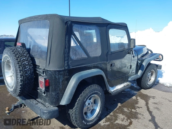 1999 Jeep Wrangler Sport with VIN 1J4FY19SXXP456810, listed as a IAAI auction lot 41725834 with 93,151 mi miles. Bid and sale history available at carsss.com. Image 4.