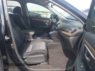 2018 Honda CR-V EX with VIN 7FARW1H59JE001943, listed as a IAAI auction lot 42123180 with 72,451 mi miles and . Bid and sale history available at carsss.com. Image 5.