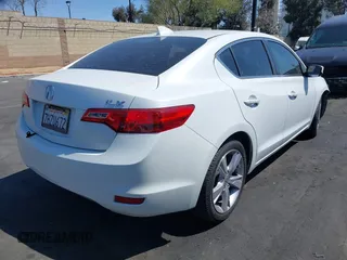 2015 Acura ILX z VIN 19VDE1F34FE009447, wystawiony jako IAAI lot #41953691 z przebiegiem 98 492 mil mil oraz . Historia ofert i sprzedaży dostępna na DreamBid. Obrazek 4.