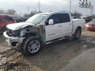 2014 Nissan Titan S with VIN 1N6AA0EC7EN503648, listed as a Copart auction lot 86517824 with 82,556 mi miles and Salvage Title. Bid and sale history available at DreamBid. Image 1.