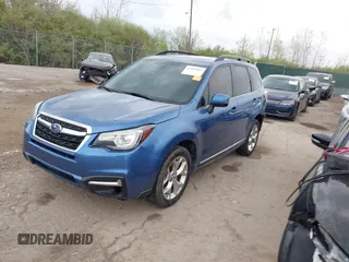 2017 Subaru Forester Touring with VIN JF2SJAWC4HH803275, listed as a IAAI auction lot 42109087 with 114,532 mi miles and . Bid and sale history available at DreamBid. Image 18.
