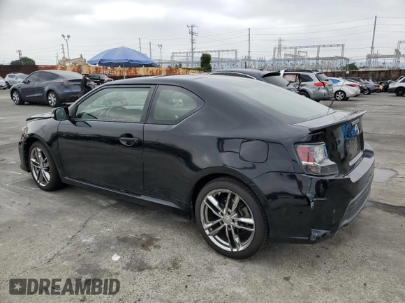 2015 Scion tC z VIN JTKJF5C75F3093123, wystawiony jako Copart lot #58414325 z przebiegiem 107 051 mil mil oraz Szkoda całkowita • Salvage title. Historia ofert i sprzedaży dostępna na DreamBid. Obrazek 2.