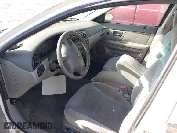2000 Ford Taurus SE with VIN 1FAFP53U3YA244156, listed as a IAAI auction lot 41204116 with 125,694 mi miles and . Bid and sale history available at DreamBid. Image 5.