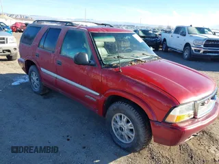 1998 GMC Jimmy SLT with VIN 1GKDT13W3W2539146, listed as a IAAI auction lot 40981941 with 1 mi miles. Bid and sale history available at carsss.com. Image 1.
