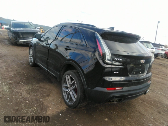 2021 Cadillac XT4 AWD Sport with VIN 1GYFZFR48MF009552, listed as a IAAI auction lot 41743125 with 53,982 mi miles and . Bid and sale history available at DreamBid. Image 3.